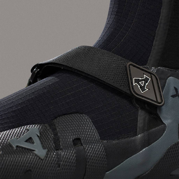 Close-up of black XCEL Drylock neoprene surf boot with strap, Melbourne Surfboard Shop