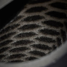 Close-up of textured wetsuit bootie lining, surf accessory at Melbourne Surfboard Shop